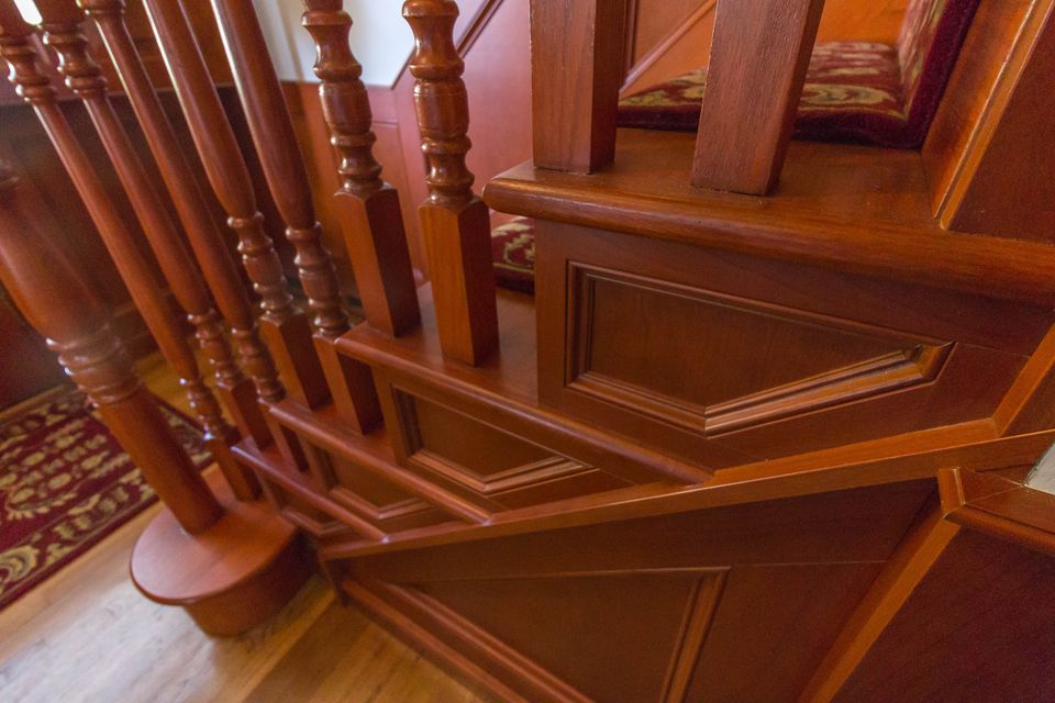 Carved wood staircase detail
